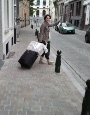 Gabriela Condrea with suitcase and books